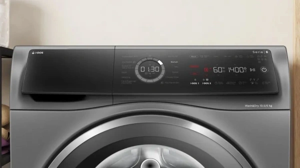 Стиральная машина Bosch Serie 8 WNC254ARSN пан.англ. класс: D загр.фронтальная макс.:10.5кг (с сушкой) серый