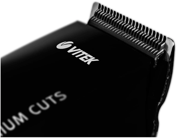 Машинка для стрижки Vitek VT-2511 черный (насадок в компл:4шт)
