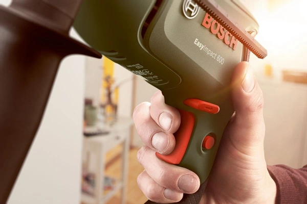 Дрель ударная Bosch EasyImpact 600 600Вт патрон:быстрозажимной реверс (кейс в комплекте) (0603133020)