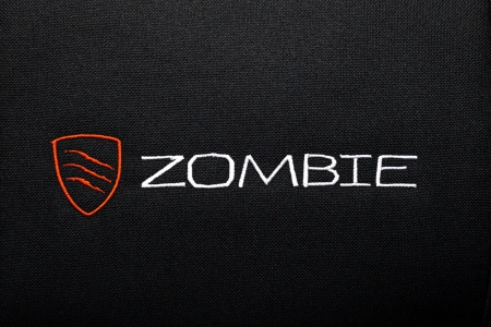 Кресло игровое Zombie Predator черный Neo Black с подголов. крестов. пластик
