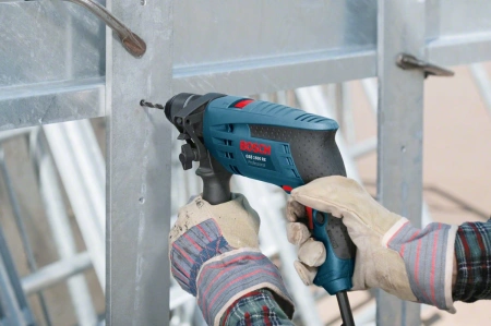 Дрель ударная Bosch GSB 1600 RE 701Вт патрон:быстрозажимной реверс (0601228200)