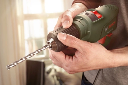 Дрель ударная Bosch EasyImpact 600 600Вт патрон:быстрозажимной реверс (кейс в комплекте) (0603133020)
