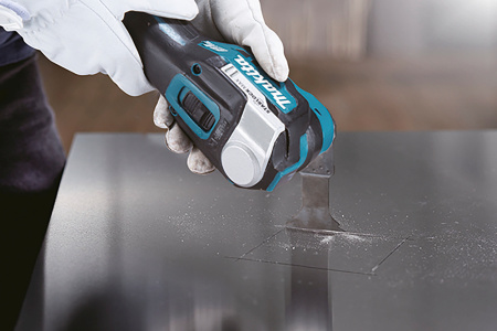 Многофункциональный инструмент Makita DTM52RTJX1 синий/черный
