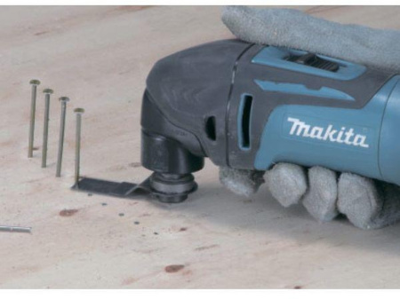 Многофункциональный инструмент Makita DTM50Z синий